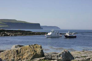 Doolin Ferries at low tide off Doolin Pier